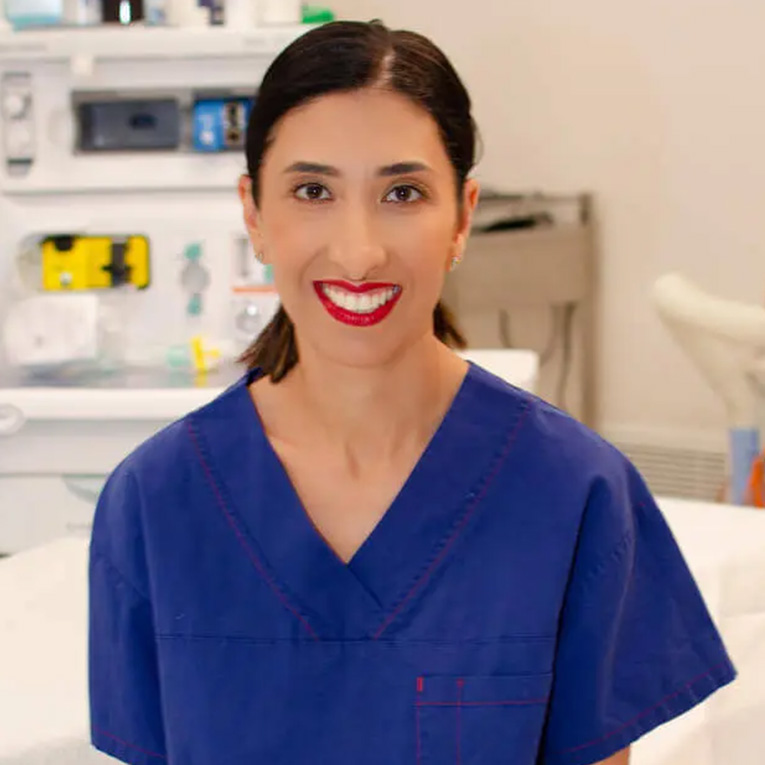 Dr Mandana Master in scrubs at her Adelaide obstetrics and gynaecology clinic